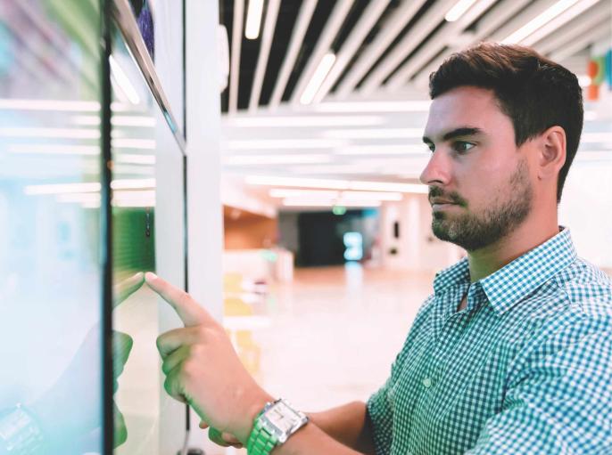 Guy using touchscreen